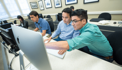 Students in Classroom working on the computer