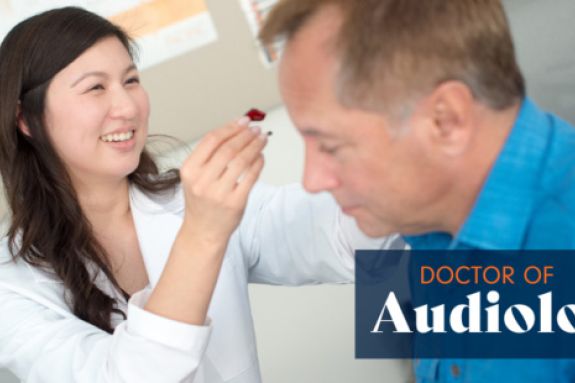 a student working with a patient