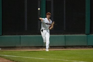 Pacific baseball player throws the ball.