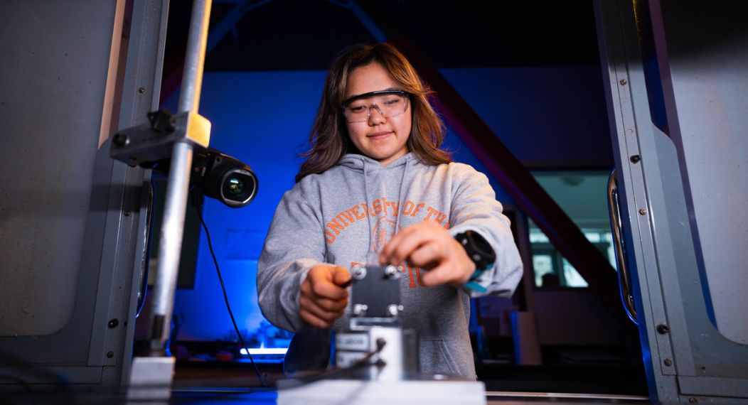 Calista Morita, mechanical engineering major, works on a project in the School of Engineering and Computer Science's advanced manufacturing lab.